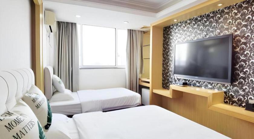 Wings Hotel Гуанчжоу Экстерьер фото